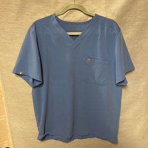 New Ceil color double pocket Figs scrub top. Never worn size large.